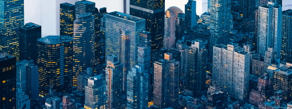 City skyline representing streamlined cross-border payment systems for corporations.
