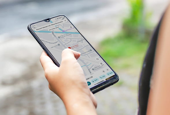 Mobile phone showing directions to StoneX JBR Recovery Ltd, helping visitors plan their site visit or delivery.