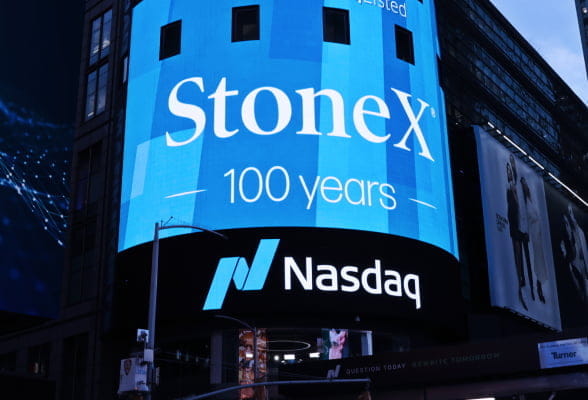 StoneX 100 years anniversary displayed on Nasdaq building, symbolizing its global presence and stability.