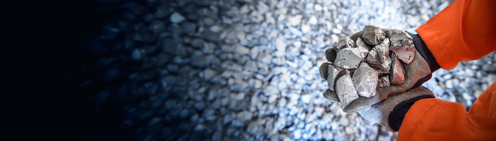 Gloved hands holding silver-bearing material recovered for processing at StoneX Metals’ UK silver recovery facility