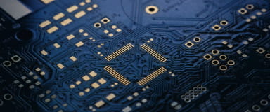 Close-up of circuit board, symbolizing StoneX Pro's low-latency platforms and API technology solutions.