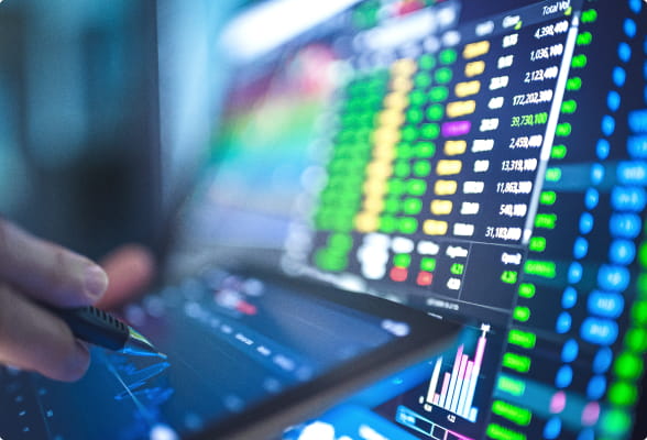 Financial data on a screen, highlighting StoneX Wealth Management's platform expertise and partnerships for wealth management and planning